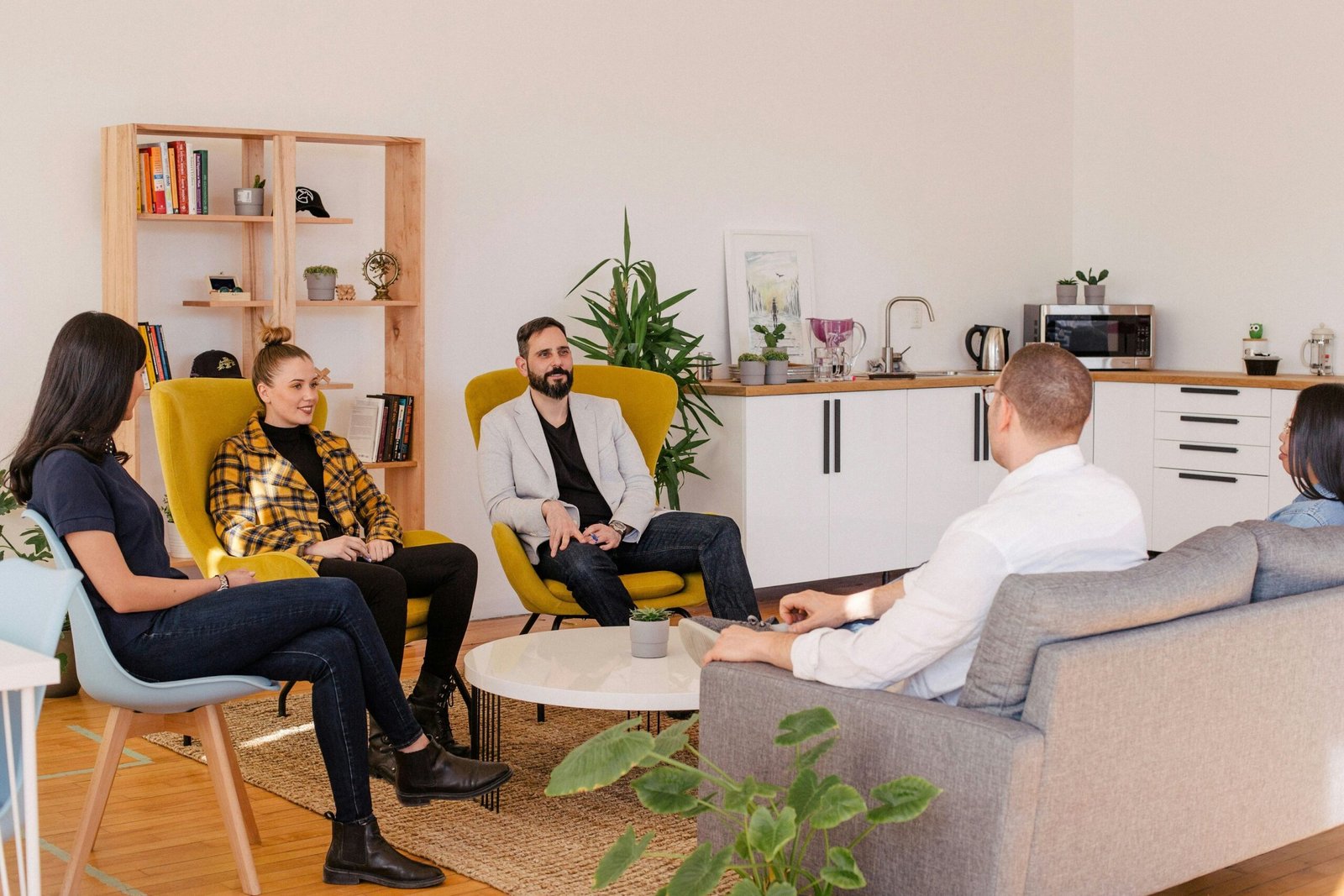 a group of people sitting around a table